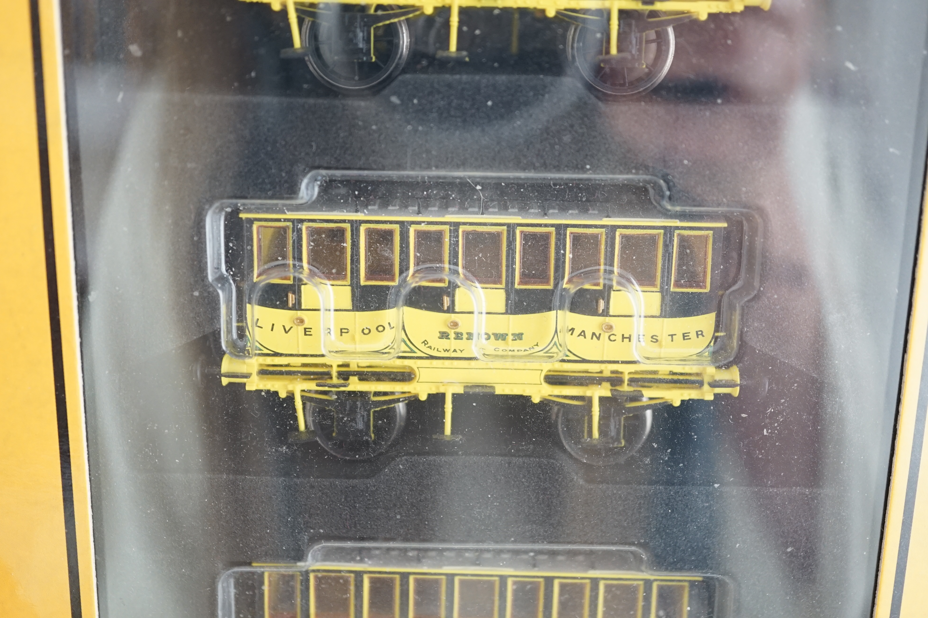 A Hornby Hobbies 00 gauge Rocket train pack (R3810), comprising of Stephenson’s locomotive Rocket and three Liverpool and Manchester 4-wheel coaches